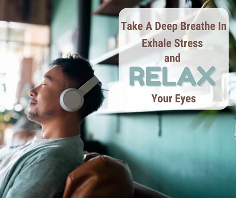 Man relaxing at home wearing headphones
